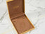Gold necklace in a presentation box, showcasing Timeless Strength Gold Anchor Chain