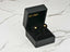 Gold CZ butterfly earrings in a black jewelry box, Whispering Wings collection