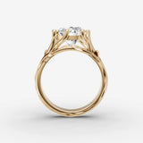 Fleur round diamond setting in gold, profile angle