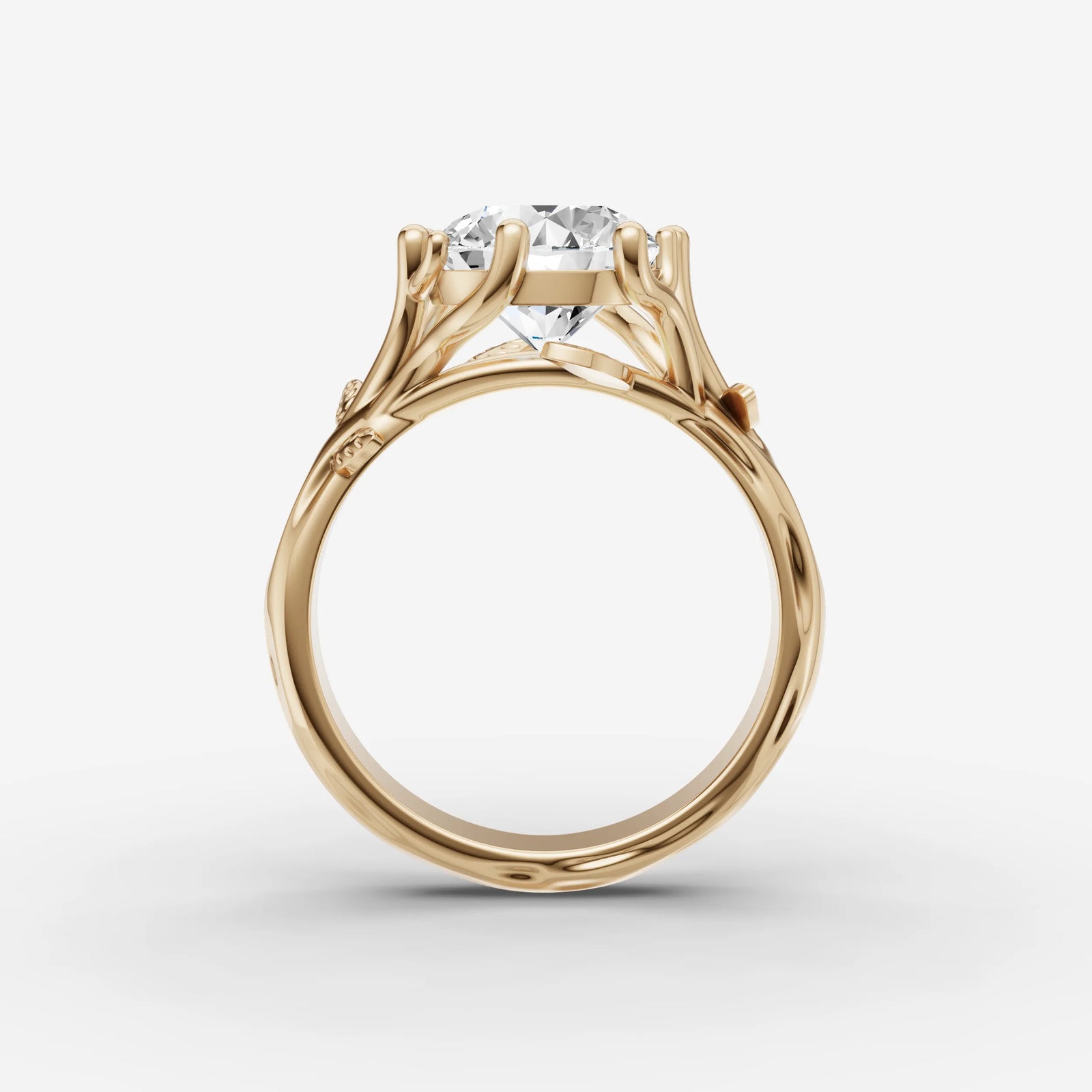 Fleur round diamond setting in gold, profile angle