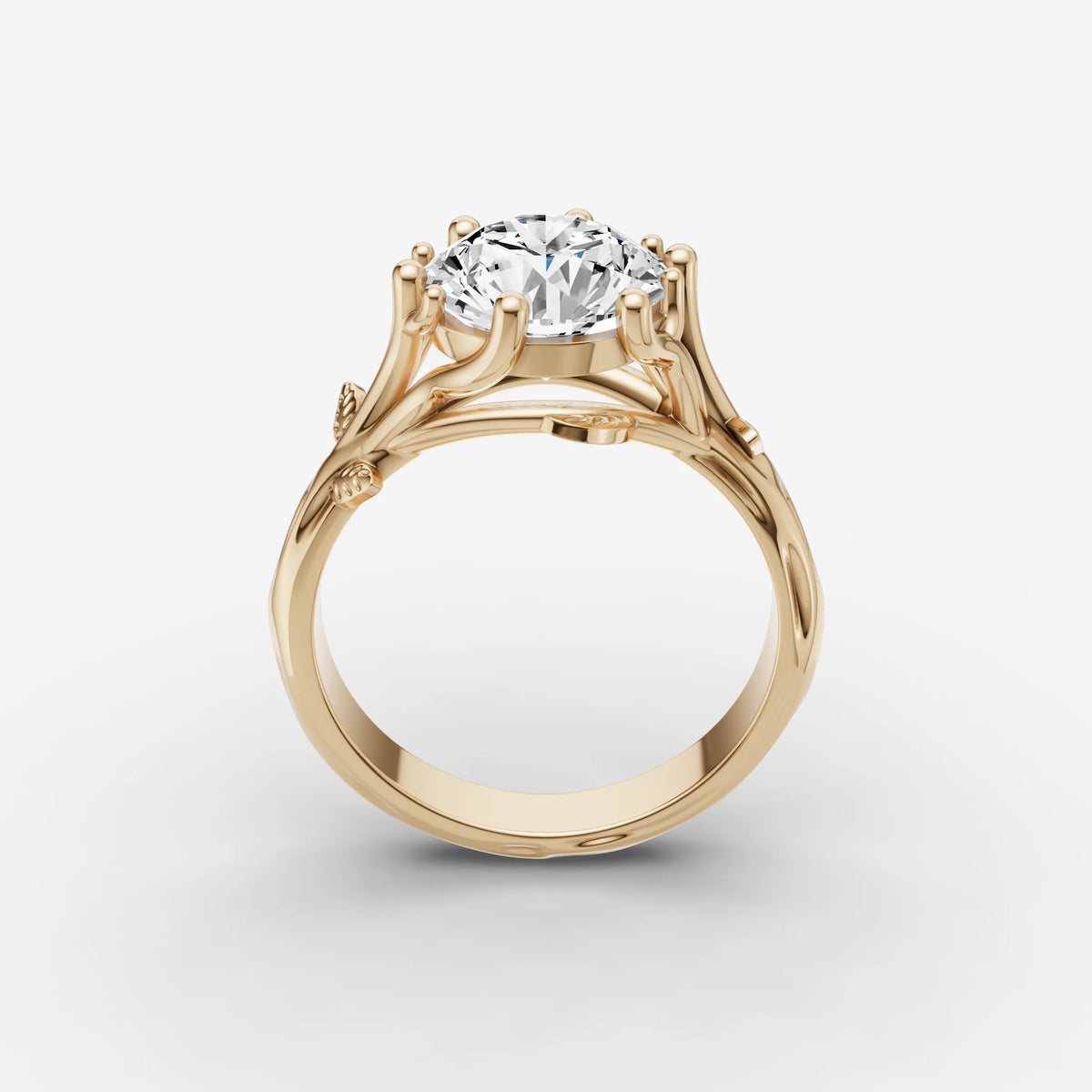 Fleur round diamond setting in gold, side view