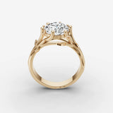 Fleur round diamond setting in gold, side view