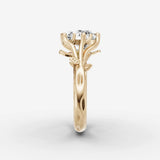 Fleur round diamond setting in gold, angled view