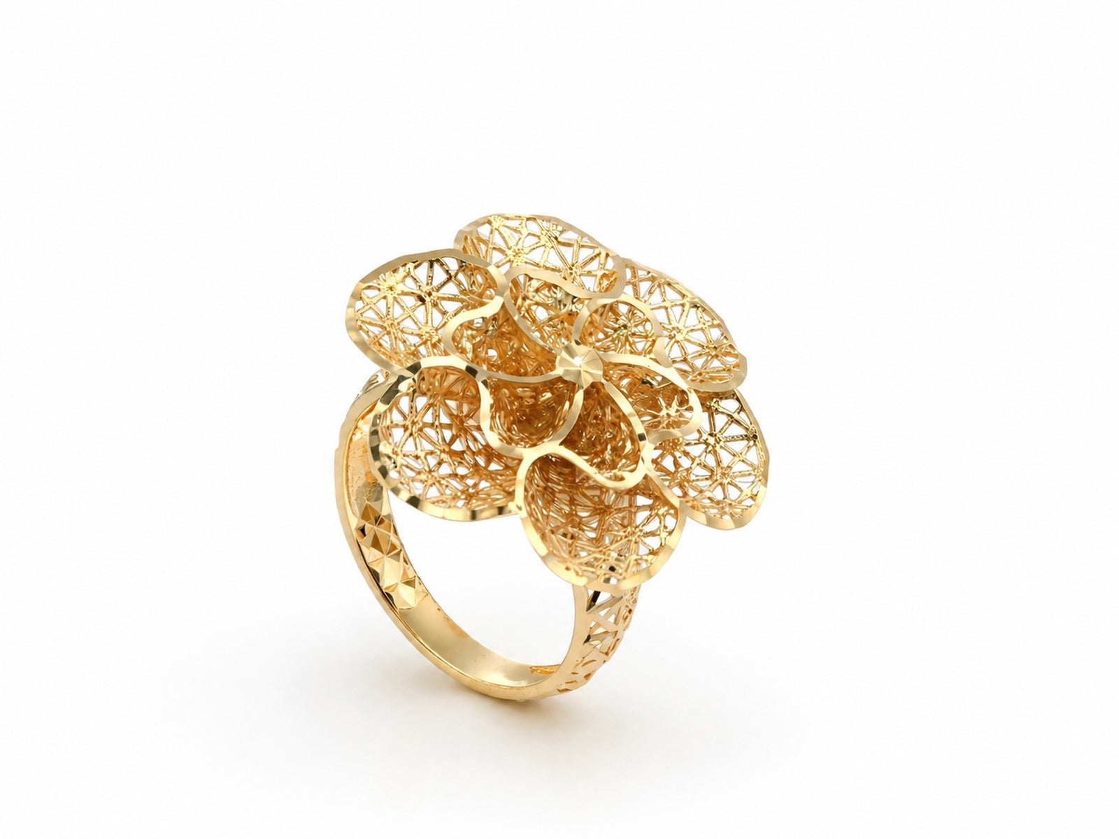 Three-quarter angle view of dimensional 18K gold flower ring showing layered openwork petals
