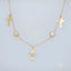 Art Gold Jewelry 18k charms anklet featuring a delicate gold chain with cross pendants and gemstones