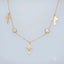 Gold necklace with three cross pendants and gemstones from Art Gold Jewelry 18k charms anklet in Greater Boston Area