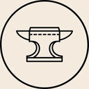 Black line-art illustration of a traditional anvil enclosed within a circular border.