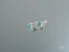 Sterling silver stud earrings with round blue topaz gemstones in 18k white gold setting