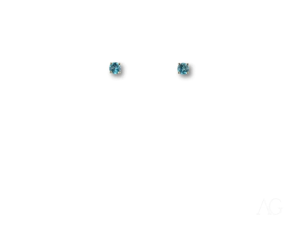 18k white gold blue topaz stud earrings with azure glow