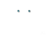 18k white gold blue topaz stud earrings with azure glow