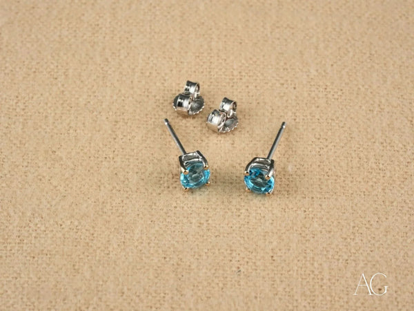 Two pairs of 18k white gold blue topaz stud earrings
