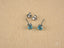 Sterling silver and 18k white gold blue topaz stud earrings from Azure Glow art gold jewelry
