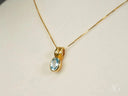 Azure Spark blue topaz pendant in art gold jewelry