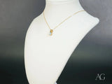 Azure Spark blue topaz pendant with two-stone gold necklace