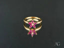 Blooming Elegance 18k gold ruby flower ring with diamond centers