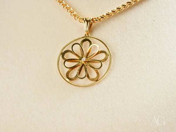Blooming Grace flower pendant in 18k solid gold with clear stone center