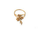 Blossom Charm 18k gold ring with diamond centerpiece in floral design