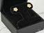 Flower-shaped diamond stud earrings in black velvet display box from Blossom Sparkle 18K Gold CZ Flower collection