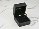 Blossom Sparkle solid 18K gold CZ flower earrings in black box