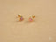 Blush Love 18k Gold Pink CZ Heart Earrings with gold heart-shaped studs and pink gemstones
