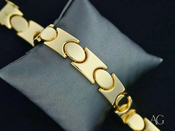Bold solid 18k gold men’s bracelet with unique link pattern