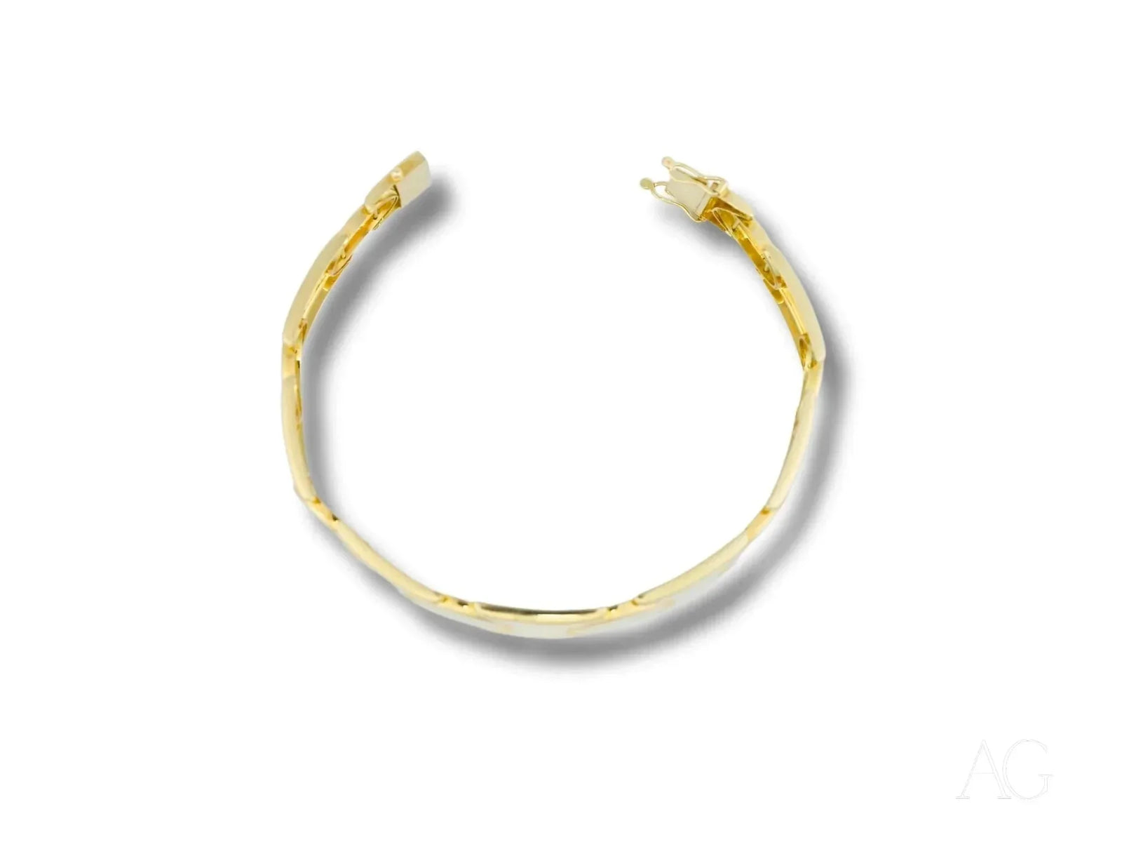 Bold men’s solid 18k gold bracelet with box clasp and unique link pattern