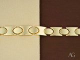 Bold men’s solid 18k gold bracelet with unique link pattern