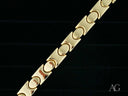 Bold men’s solid 18k gold bracelet with unique link pattern