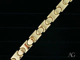 Bold men’s solid 18k gold bracelet with unique link pattern