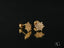 Celestial Bloom Gold CZ Flower Earrings in solid 18K gold with starburst design and gemstones