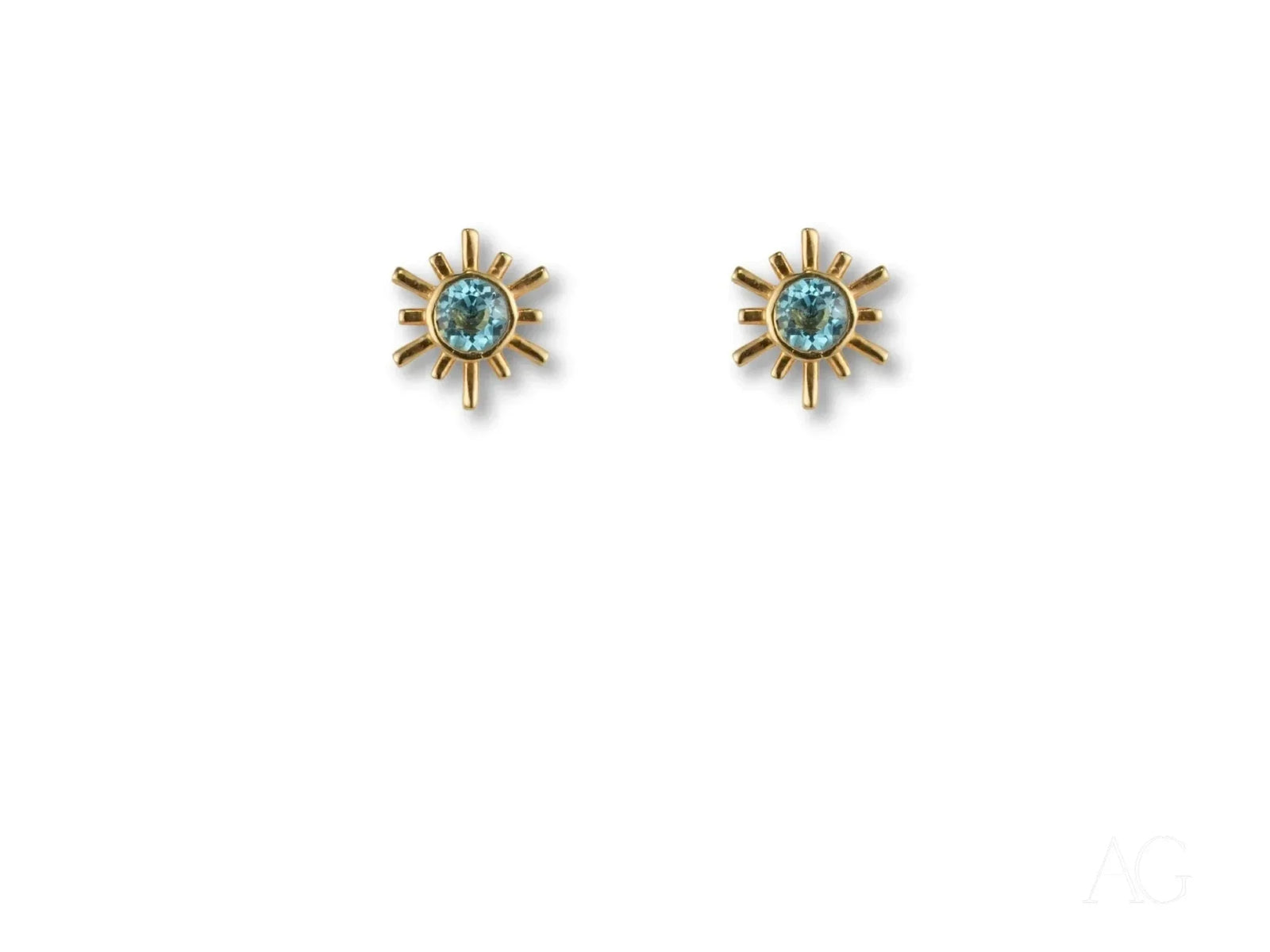 Celestial Glow gold blue topaz stud earrings with sunburst design