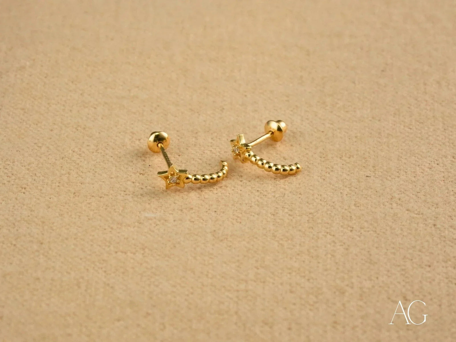 Celestial Glow gold star earrings with beaded crescent design