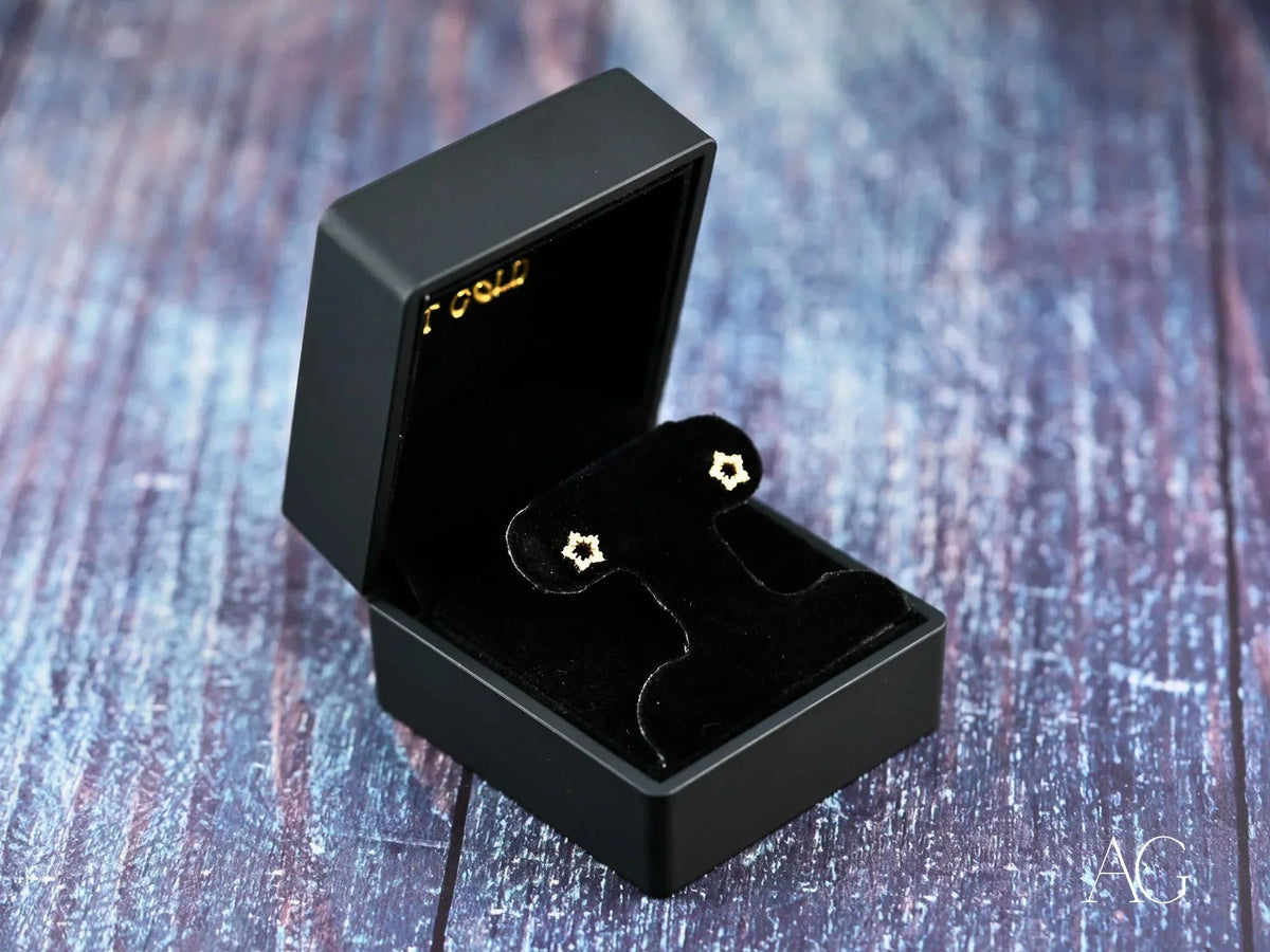Dazzling 18k yellow gold CZ star earrings in black box - Celestial Glow