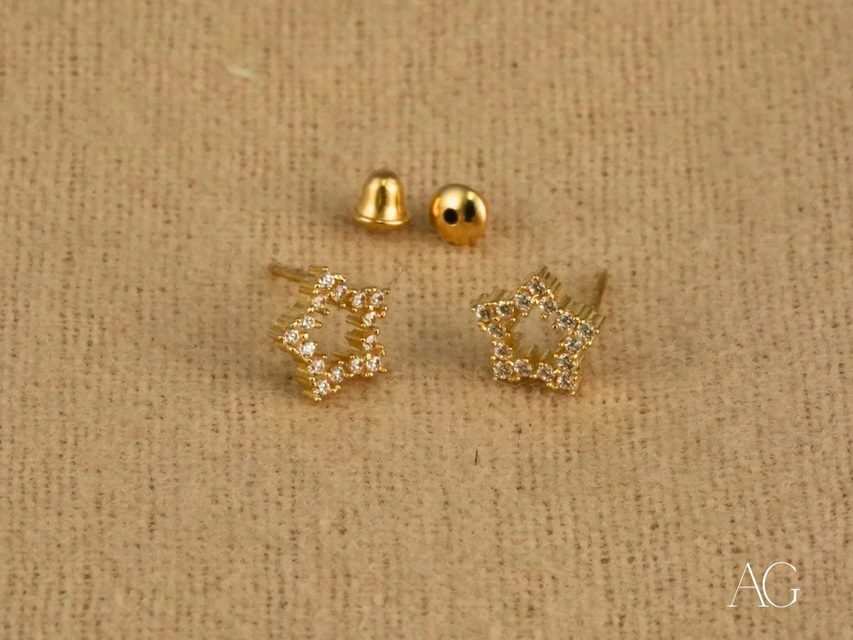 Dazzling 18k yellow gold CZ star stud earrings with gem accents