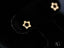 Dazzling 18k gold star earrings with small diamonds, perfect for elegant jewelry