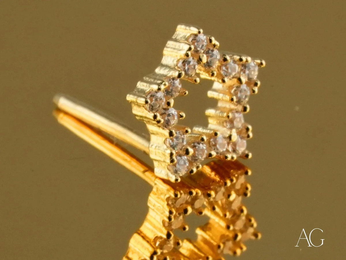 Dazzling 18k yellow gold CZ star nose stud with clear gems