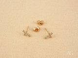 Celestial Grace 18K gold cross CZ stud earrings with rose gold and clear gems