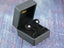 Dark grey jewelry box with silver stud earrings from Celestial Love 18K Gold Moon jewelry
