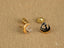Celestial Love earrings featuring 18K gold moon and heart art gold jewelry with diamonds