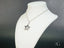 Silver-toned necklace with a textured star pendant from Celestial Radiance art gold jewelry collection