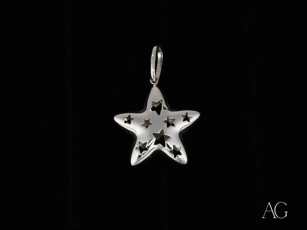 Shiny 18k white gold Celestial Radiance star pendant with cut-out stars