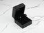 Black jewelry box with celestial spark 18k gold star CZ kids earrings display