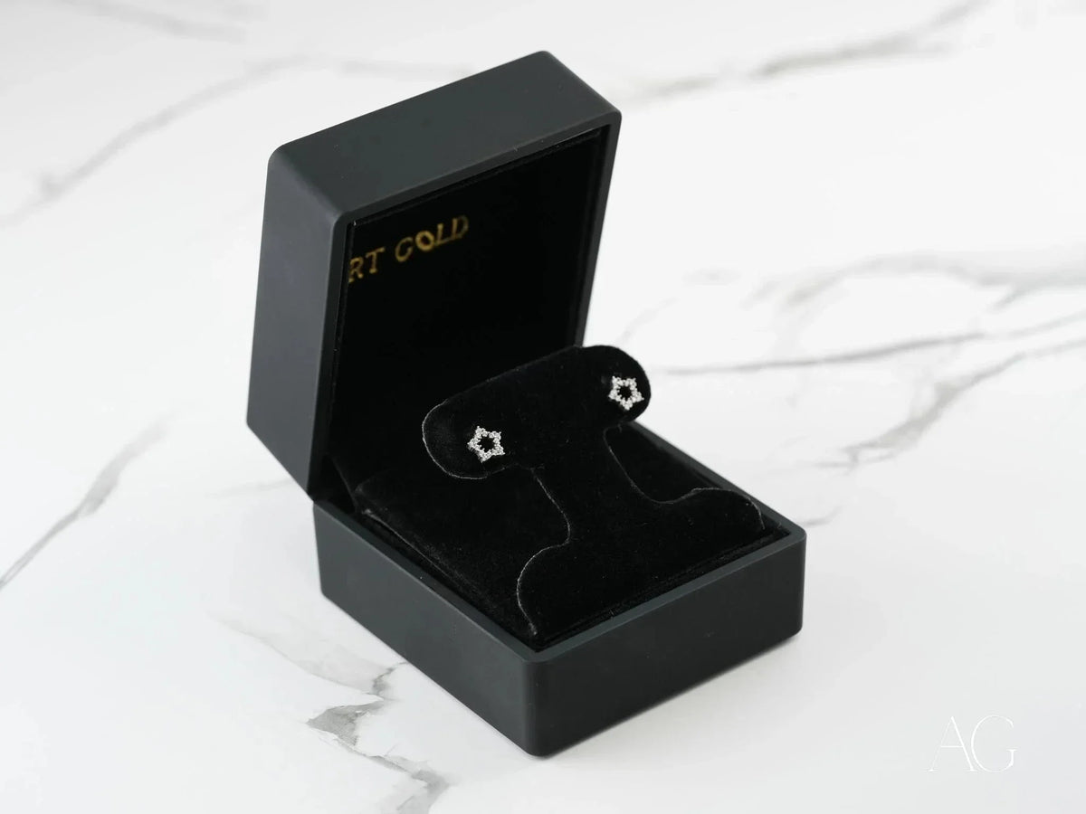 Celestial Spark 18k white gold star CZ earrings in black box