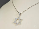 Celestial Star of David pendant in 18k white gold CZ