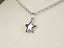 Silver chain necklace with celestial star pendant in 18k white gold art jewelry