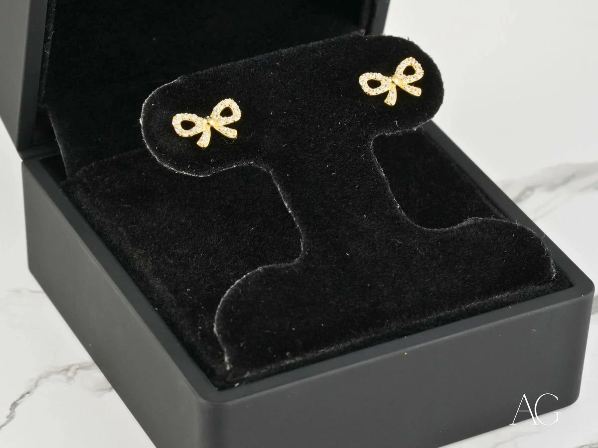 Charming Bow solid 18k gold CZ bow earrings in black velvet box