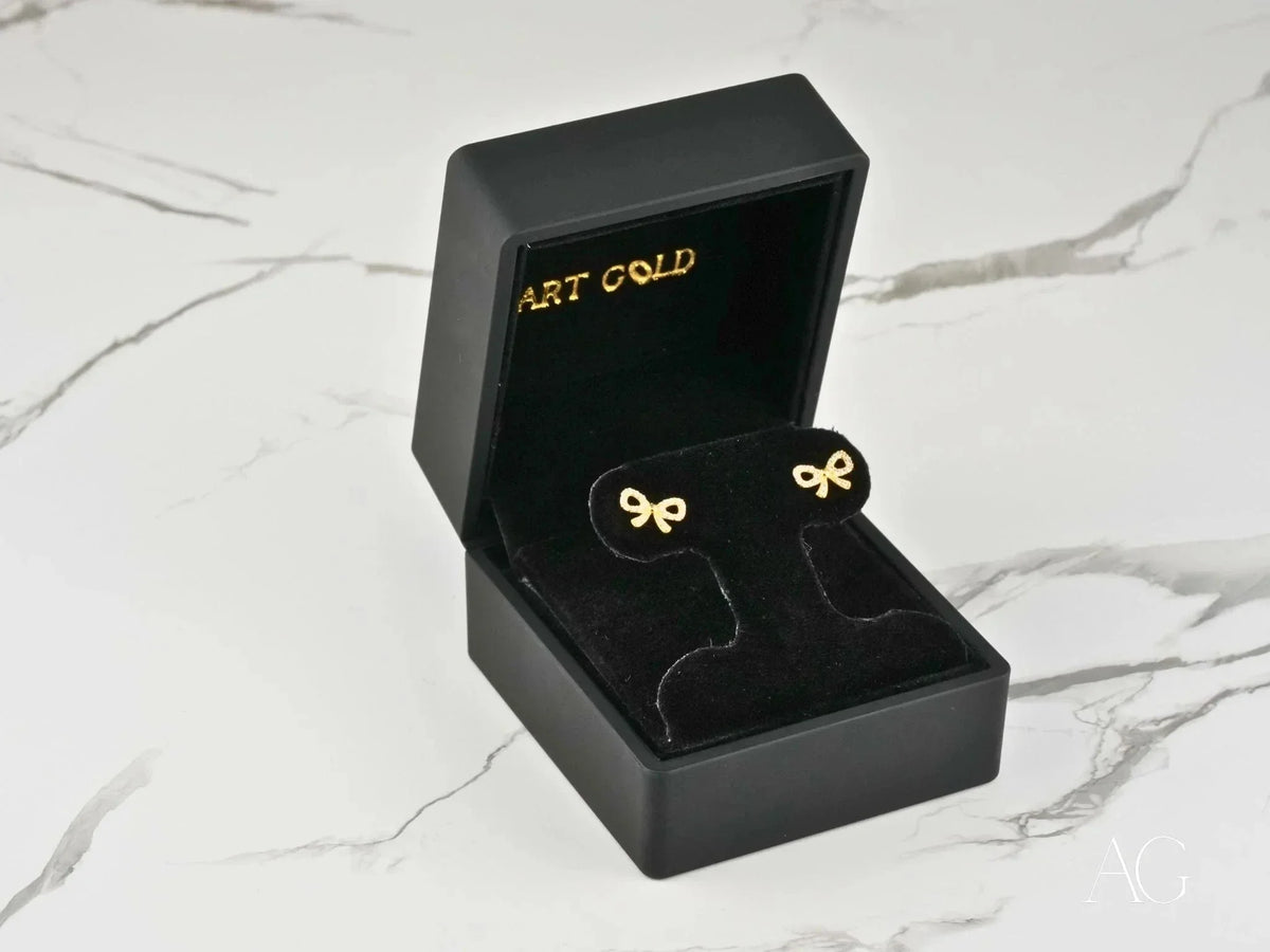 Charming Bow 18K solid gold CZ bow earrings in black velvet box