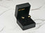 Black velvet jewelry box with charming bow earrings in solid 18k gold art gold jewelry