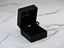 Open black velvet jewelry box with sparkling gold CZ heart bow earrings for sale
