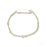 18k yellow gold ID bracelet with boy motif charm and engravable bar